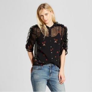 Sheer black floral blouse